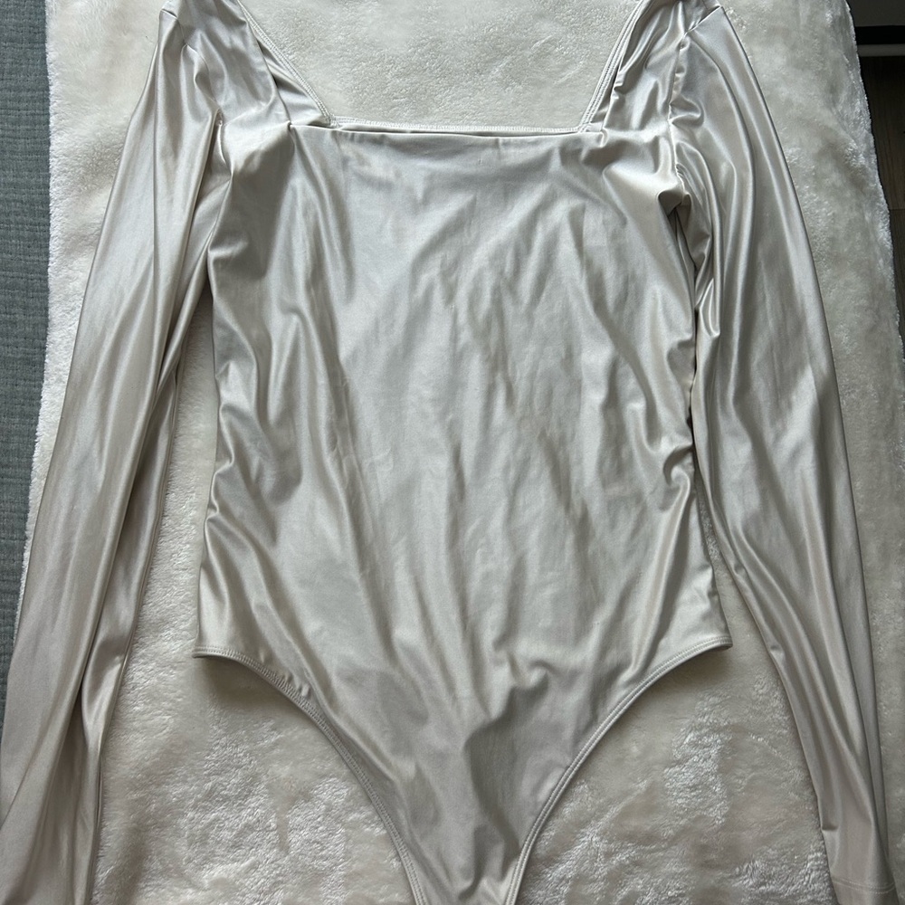 Elegant Cream Long Sleeve Bodysuit